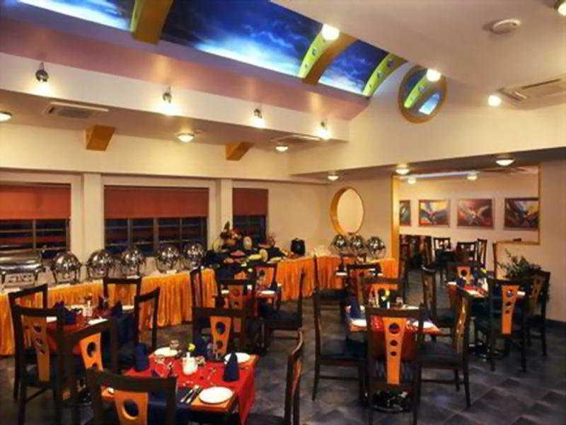 Royal Orchid Beach Resort & Spa, Utorda Beach Goa Restaurante foto